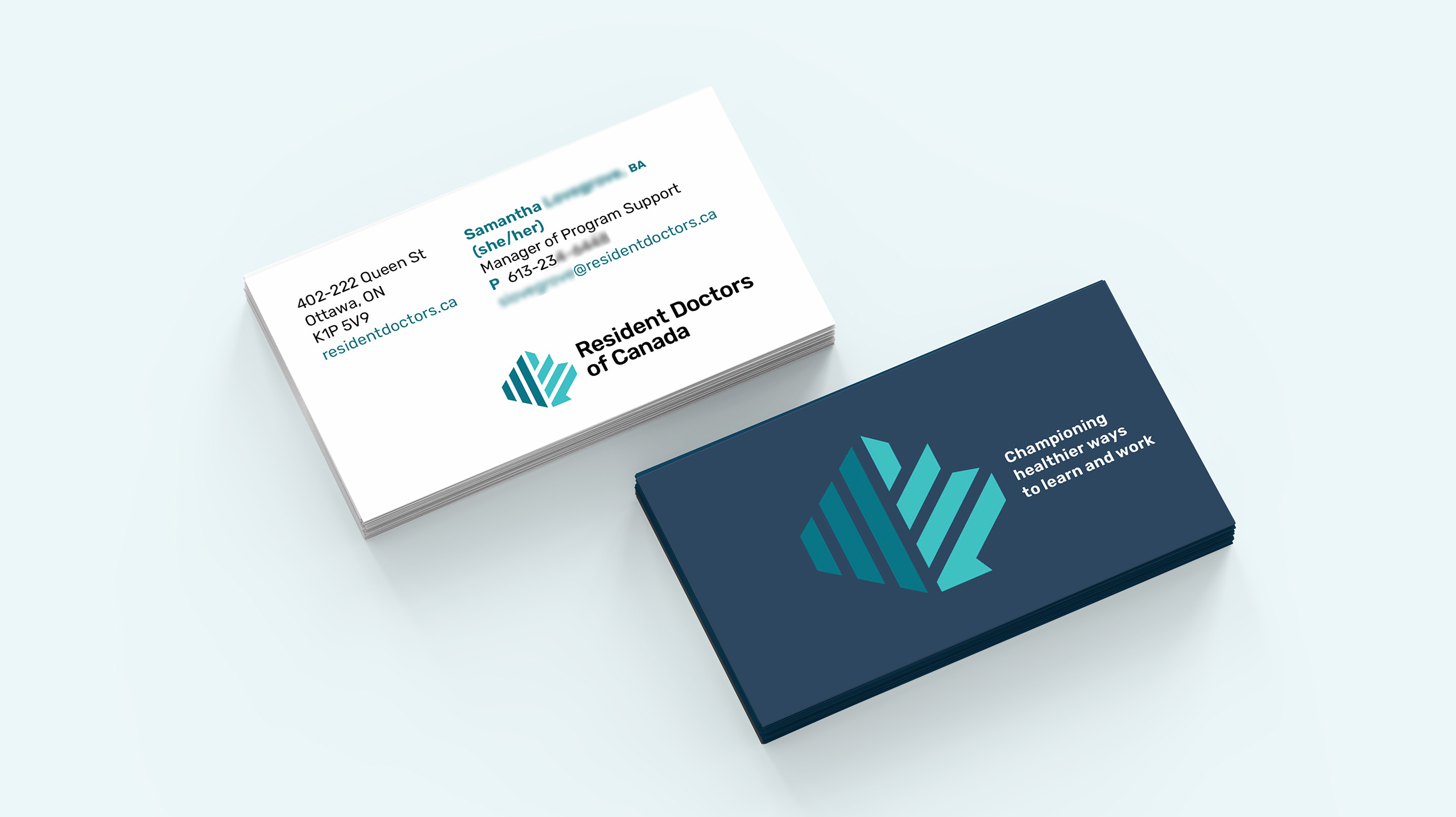 Resident Doctors of Canada business cards with bilingual contact details and logo application, showcasing consistent visual identity across print materials.