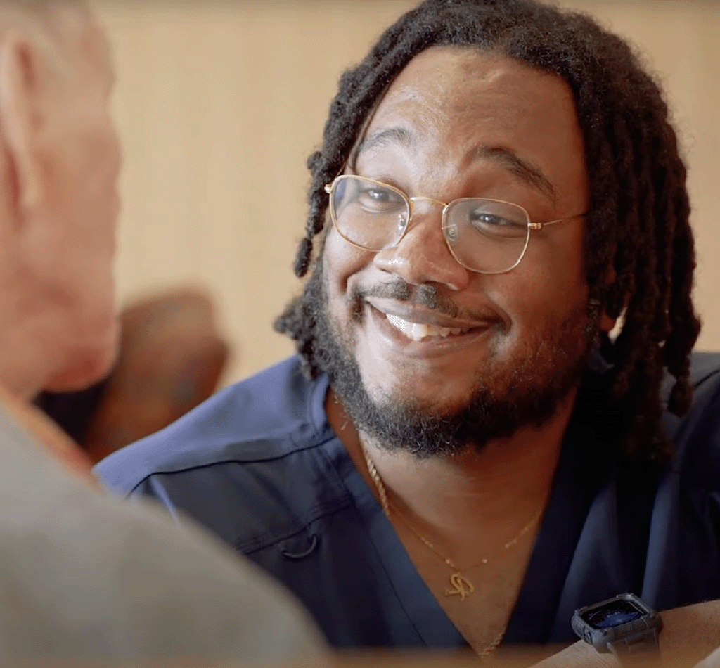 Close-up of a Personal Support Worker interacting warmly with an older adult, featured in Intent’s CESBA healthcare careers campaign.