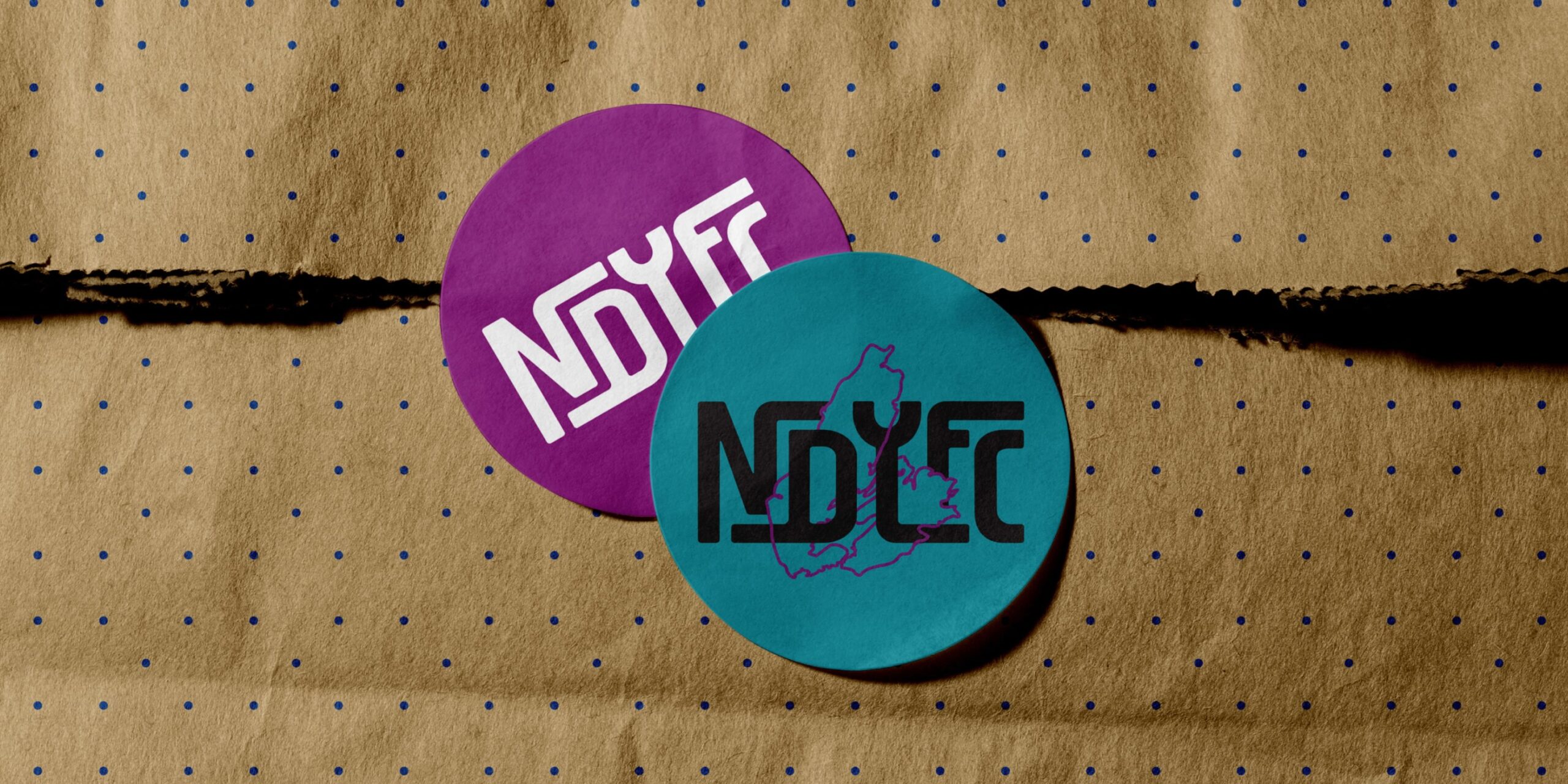 Illustrated New Dawn Youth and Family Centre stickers featuring elements geared towards a youth audience.