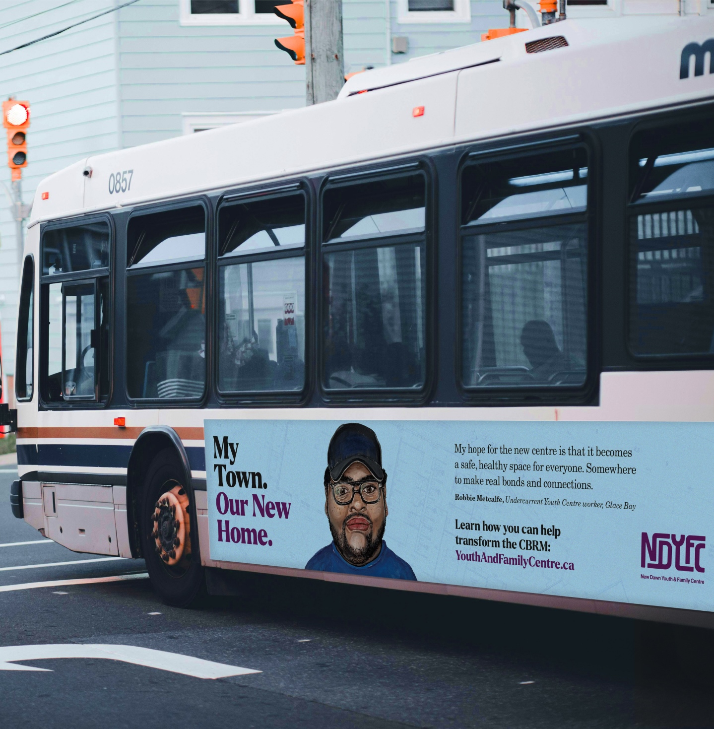 Public transit bus displaying New Dawn's Change Starts Here campaign advertising.