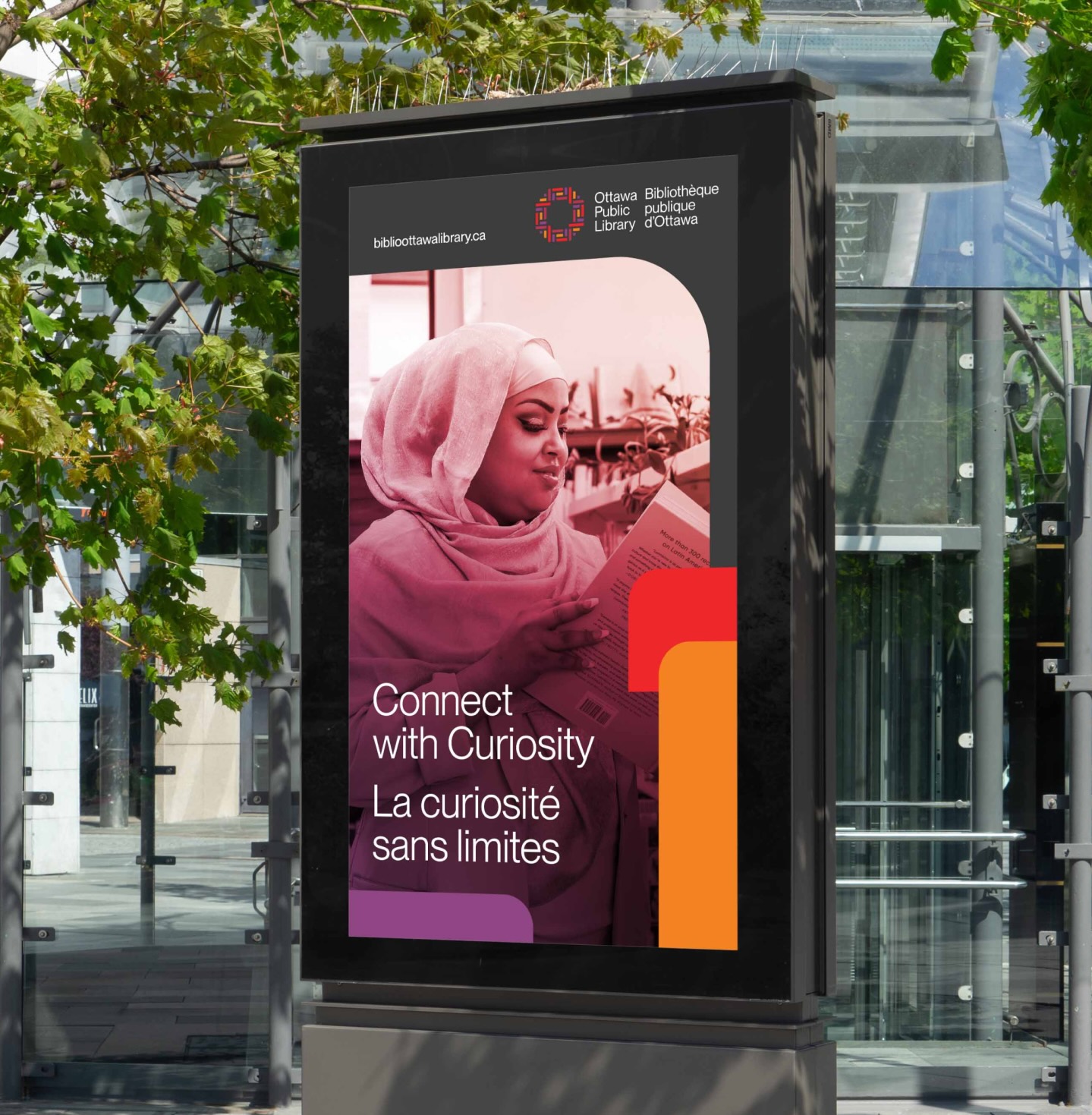 Transit shelter poster for Ottawa Public Library campaign with photography and graphic overlays from brand system by Intent