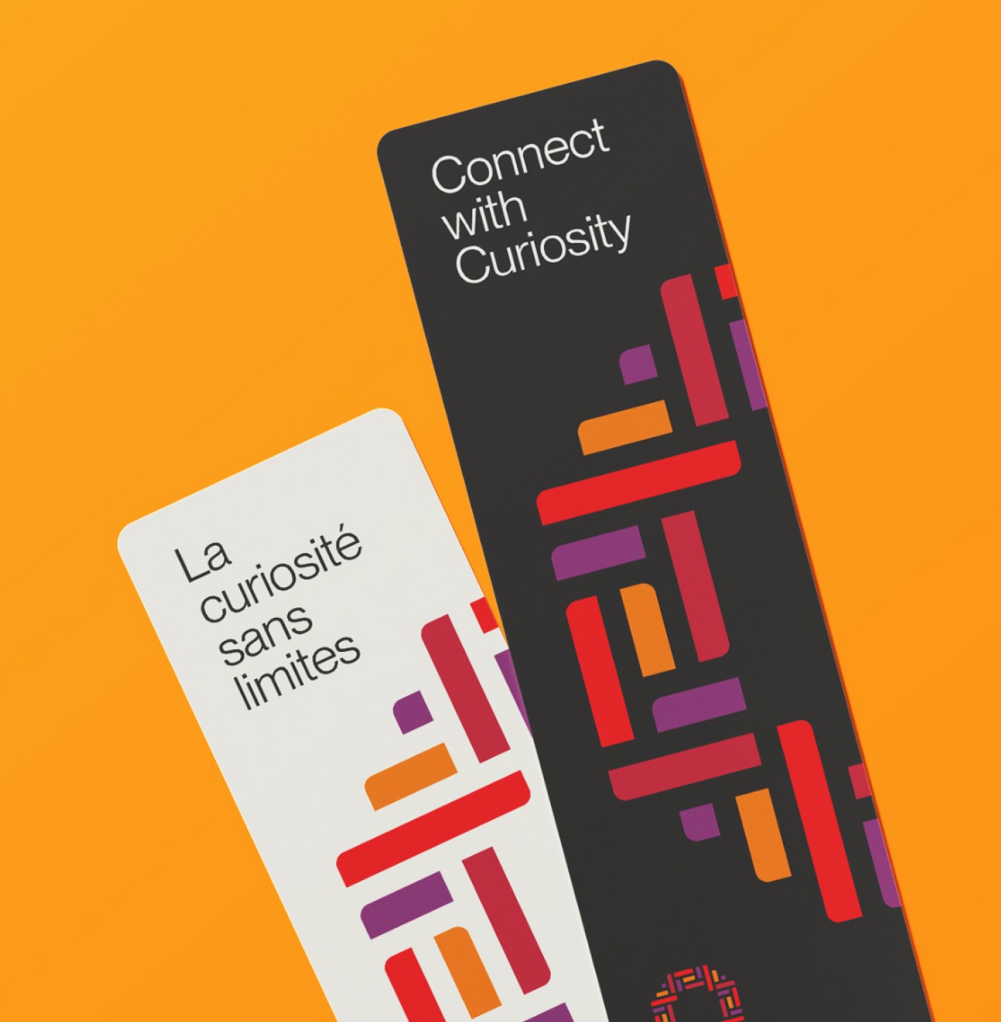 Printed Ottawa Public Library materials including bookmarks and cards using brand colours and patterns designed by Intent