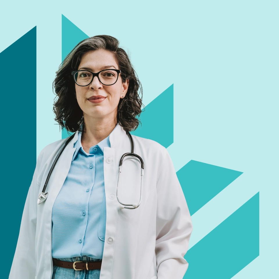 A doctor standing in front of the new RDoc branding created by Intent.